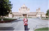 Yours truly slumming it outside my new pad, the Umaid Bhawan Palace hotel, Jodhpur, the Blue City. (Sadly the maharaj was unavailable for a cup of chai and a gossip!!!)