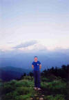 Me and my Robbie shirt atop Poon Hill at 5-30am with Dhaulagiri Himalayas in background